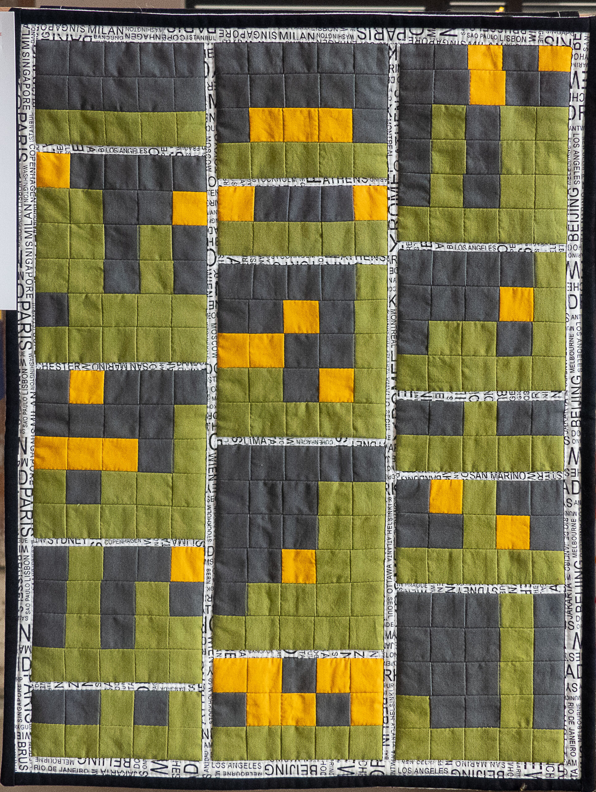 Modern quilt with squares and rectangles
