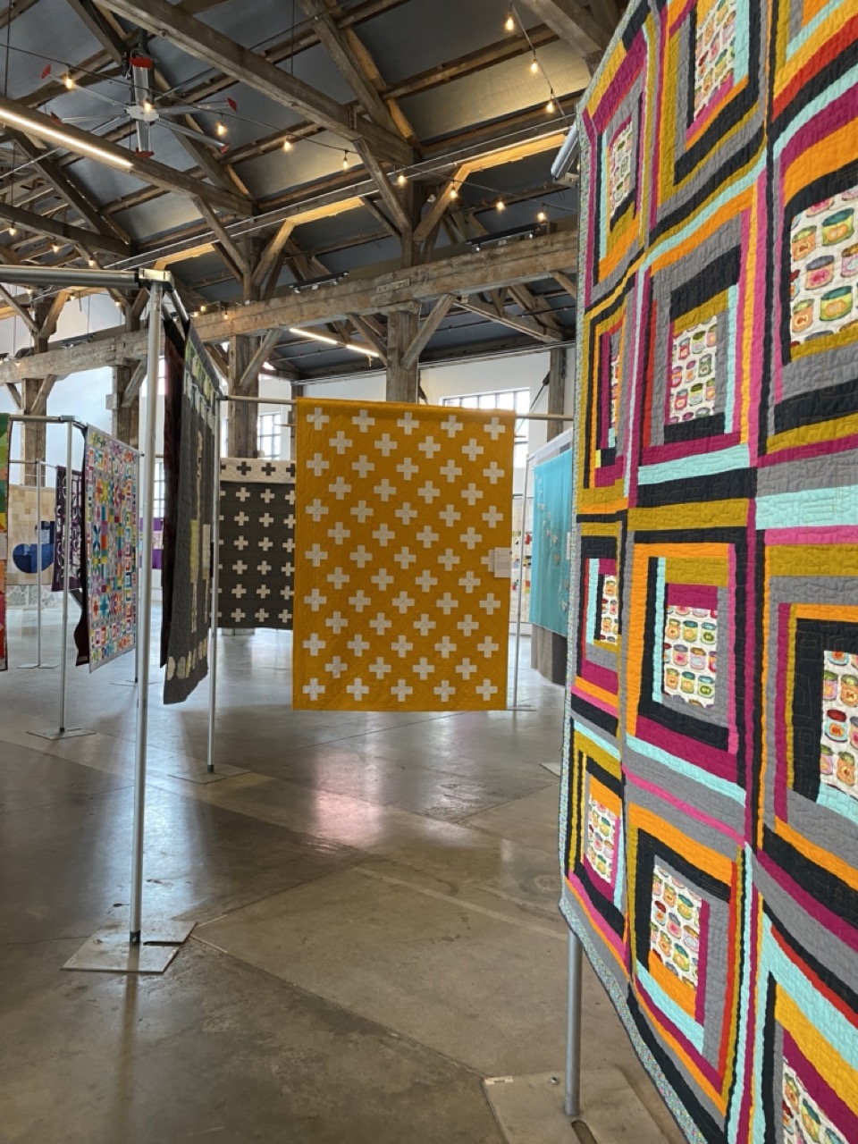 a group of modern quilts